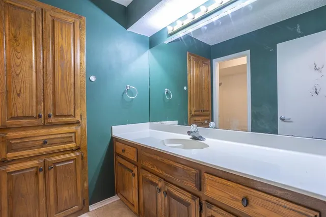 an empty room with a bathroom