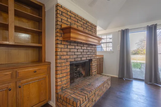 a bathroom with a sink and a fireplace