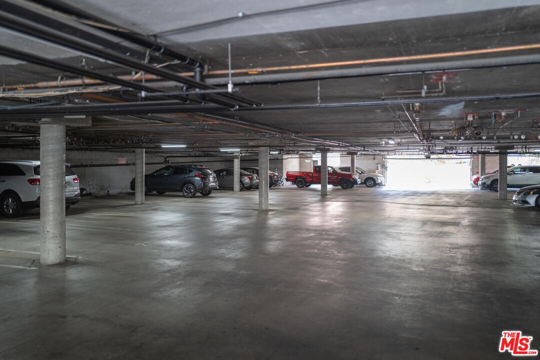 331 South Gramercy Place, Unit 101 Los Angeles, CA 90020 - Photo 7 of 7 a view of a room with wooden floor