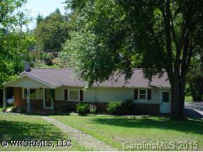 160 Gouges Branch Road Leicester, NC 28748 - Photo 2 of 6 a front view of a house with a garden