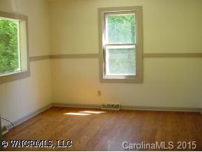 160 Gouges Branch Road Leicester, NC 28748 - Photo 4 of 6 an empty room with a window
