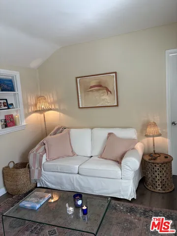 a living room with furniture and a couch