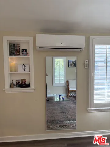 a view of a living room and window