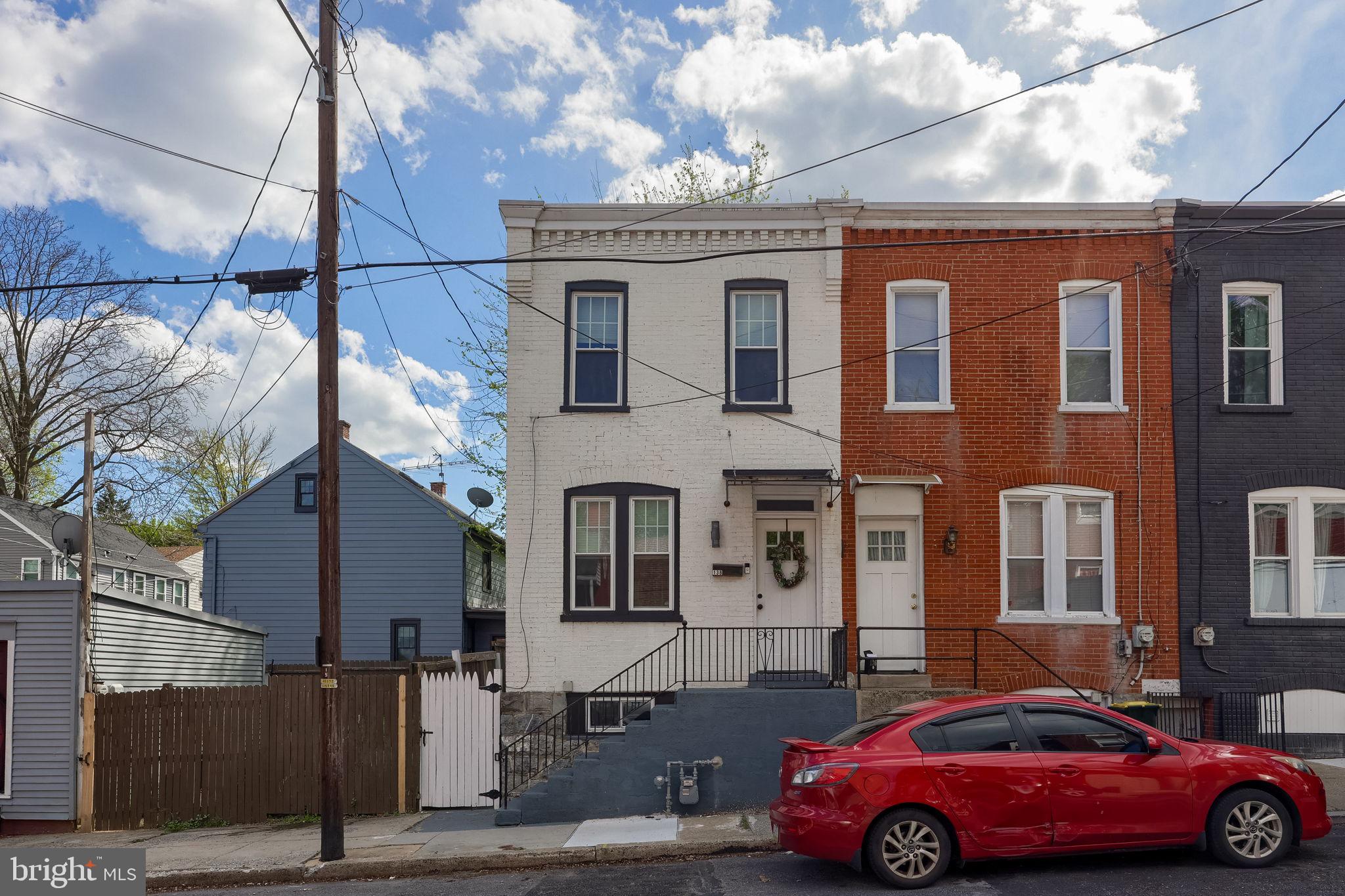 138 Laurel Street Lancaster, PA 17603 - Photo 1 of 42 a front view of a building with parking space