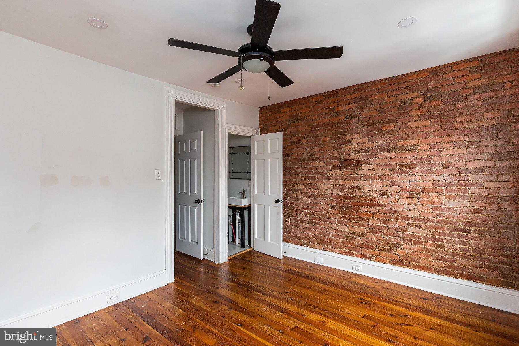 138 Laurel Street Lancaster, PA 17603 - Photo 26 of 42 a view of empty room with wooden floor