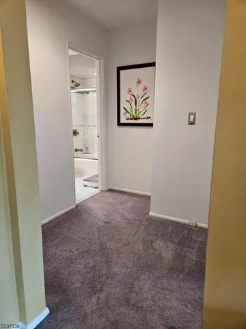 an empty room with shelves