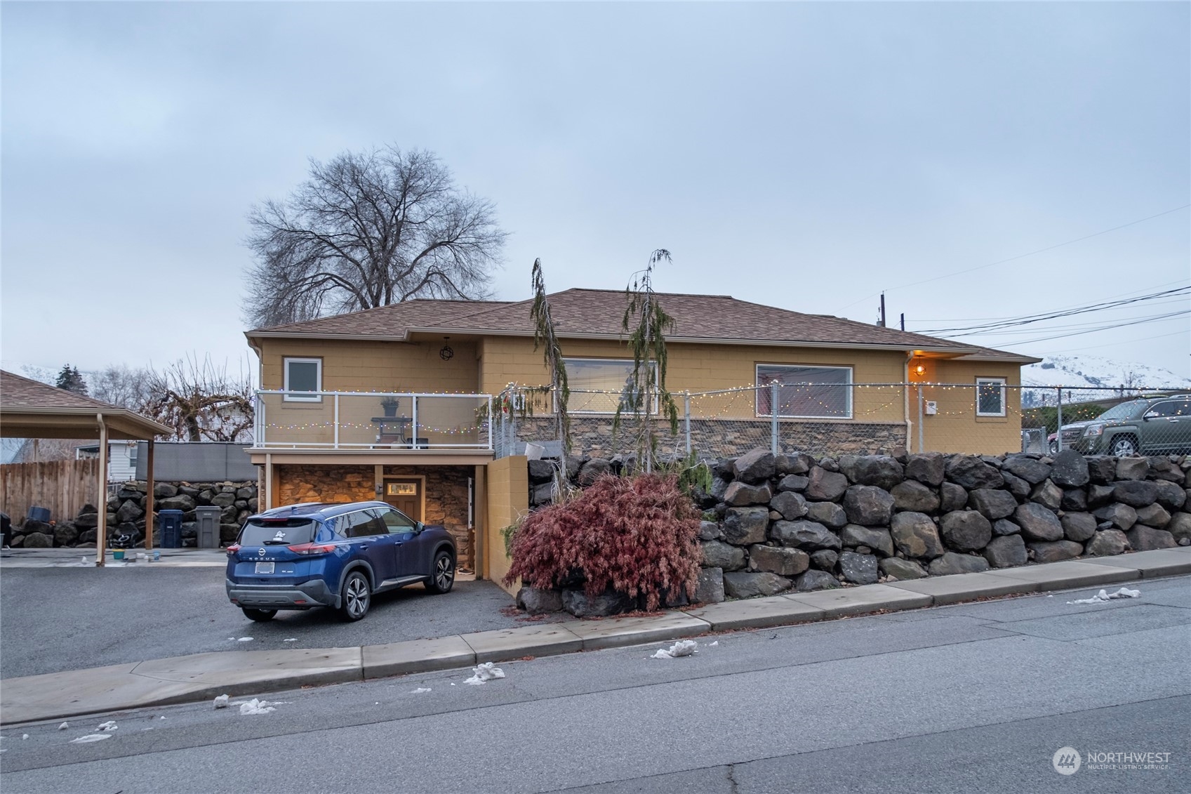 1201 Monitor Avenue Wenatchee, WA 98801 - Photo 2 of 24 a car parked in front of a house