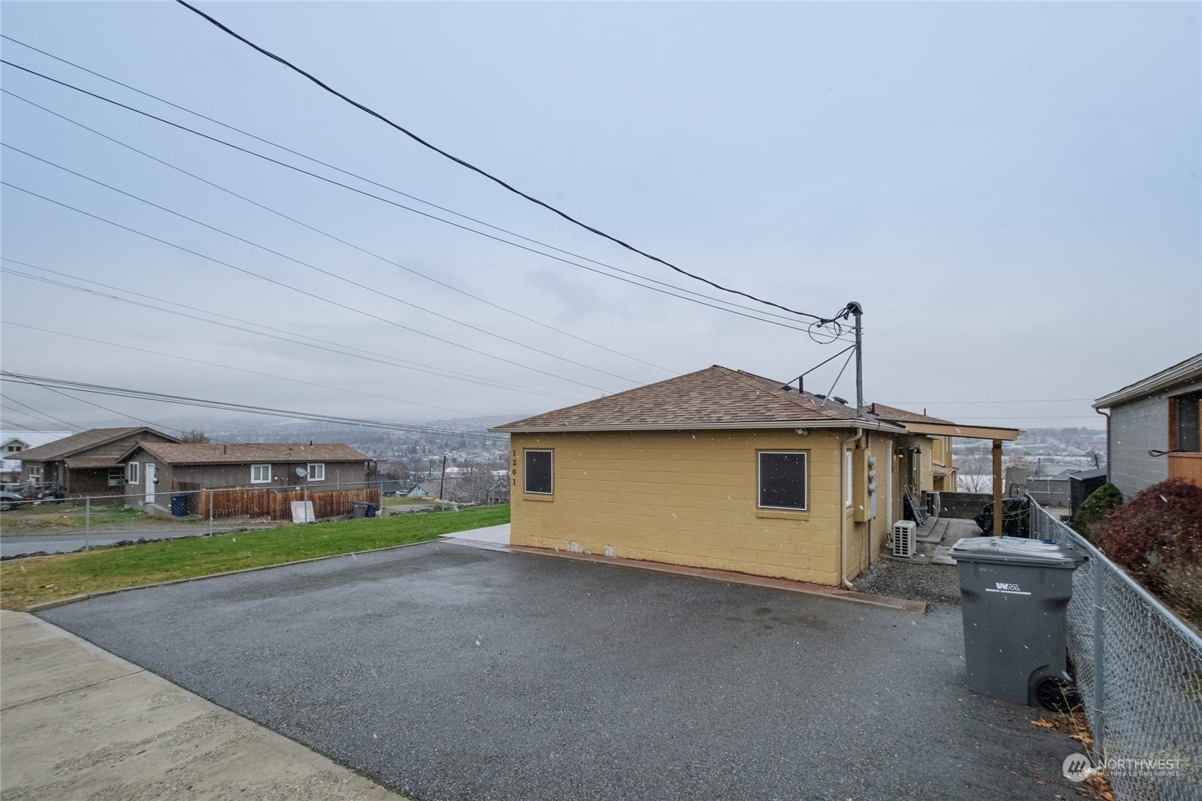 1201 Monitor Avenue Wenatchee, WA 98801 - Photo 22 of 24 a view of a house with a backyard and porch