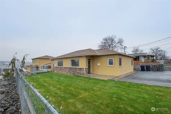 a house view with a garden space