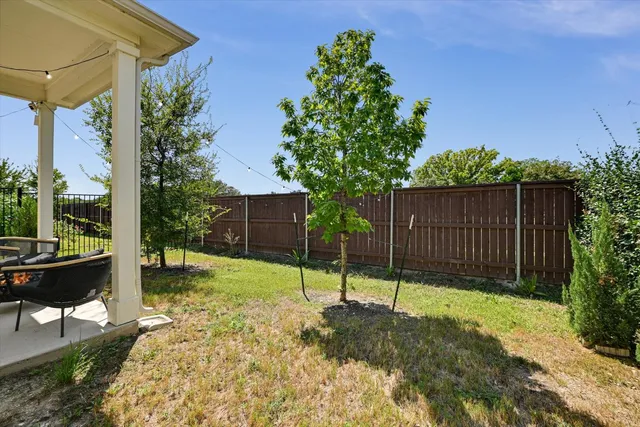 a view of a backyard with a garden