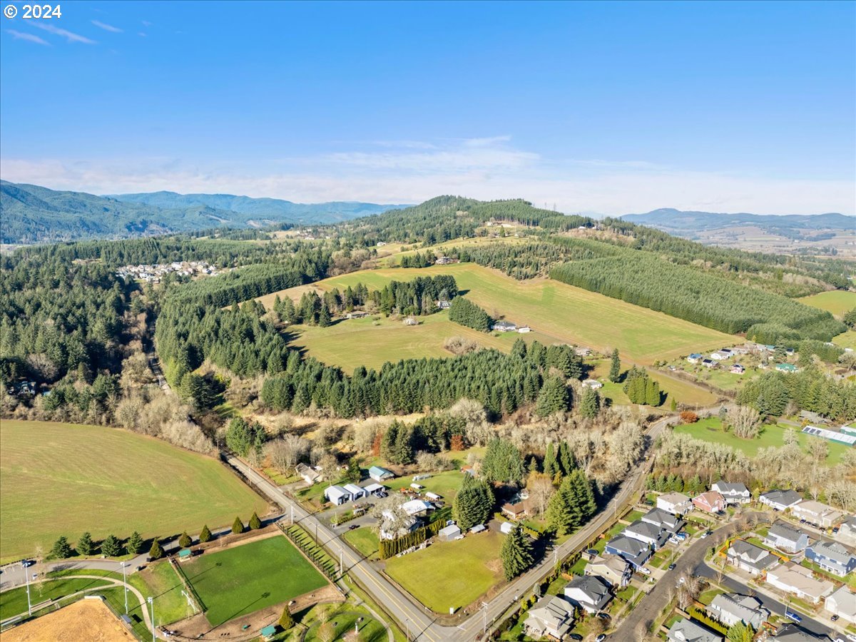 45157 Northwest David Hill Road Forest Grove, OR 97116 - Photo 14 of 15 an aerial view of residential houses with outdoor space