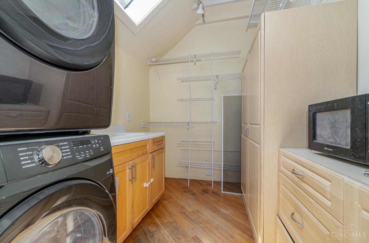 3 Foxhall Court Cincinnati, OH 45219 - Photo 13 of 37 unit 1 laundry room on upper level