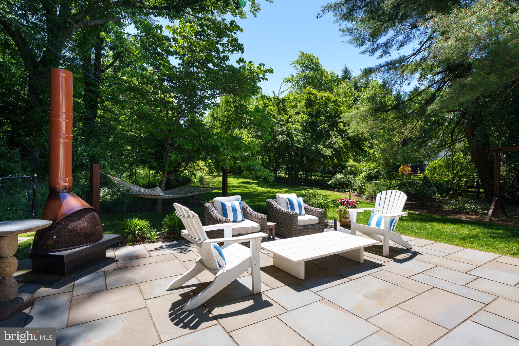 528 Mercer Road Princeton, NJ 08540 - Photo 35 of 43 Serene patio oasis in lush greenery.