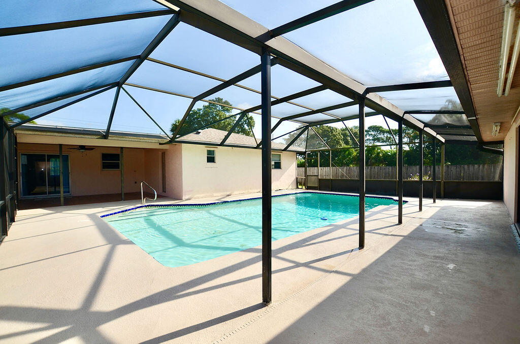 2789 Devine Road Fort Pierce, FL 34981 - Photo 54 of 133 pool towards front house
