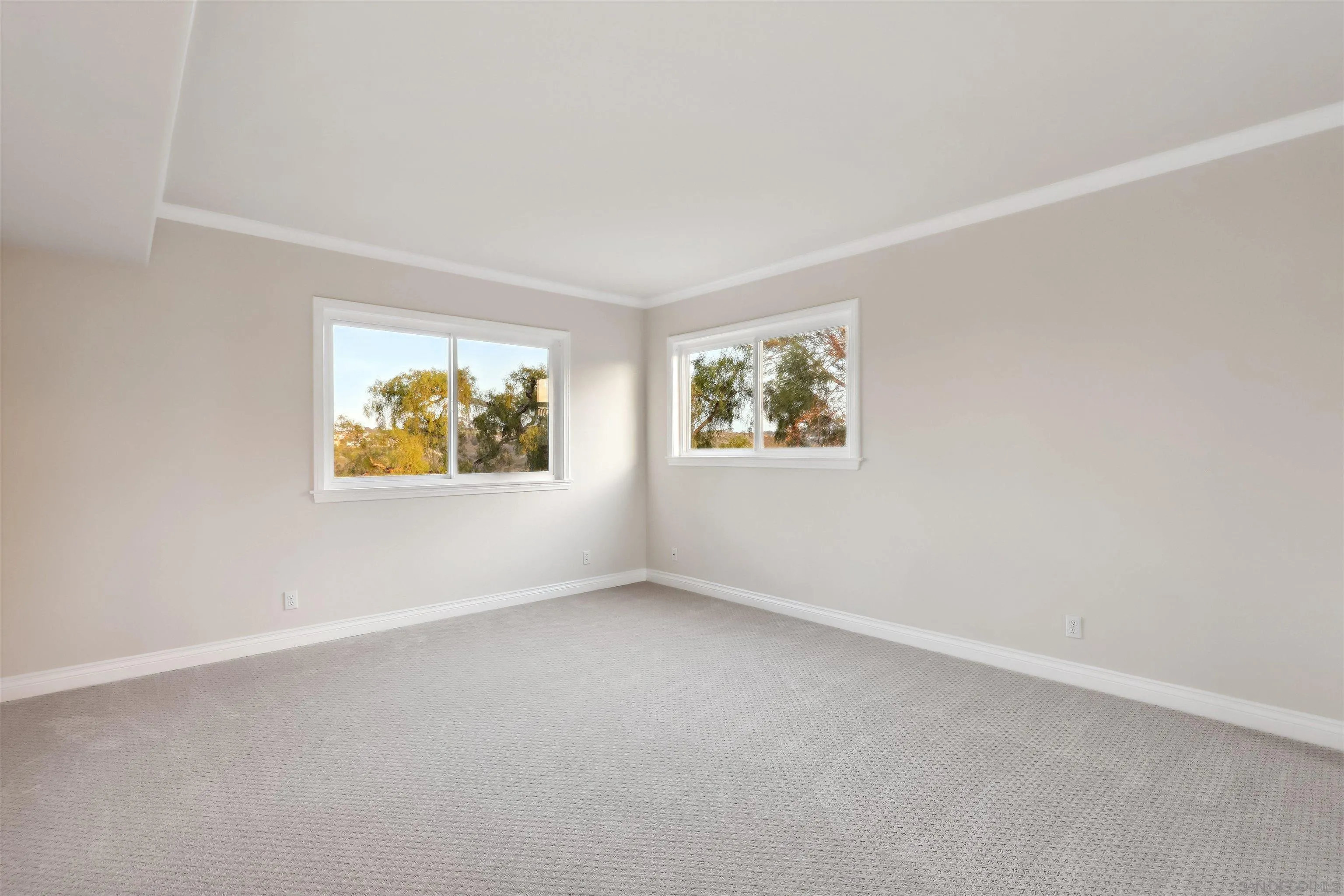 1449 Rainbow Ridge Lane Encinitas, CA 92024 - Photo 25 of 58 an empty room with windows