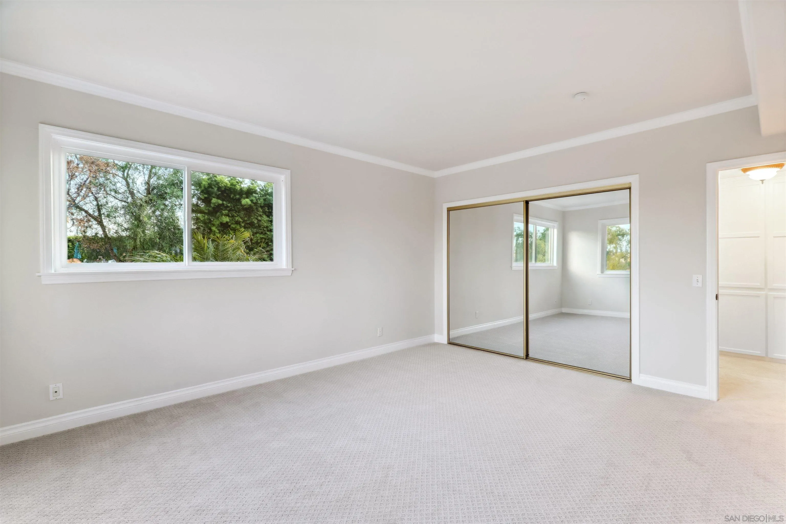1449 Rainbow Ridge Lane Encinitas, CA 92024 - Photo 26 of 58 an empty room with windows