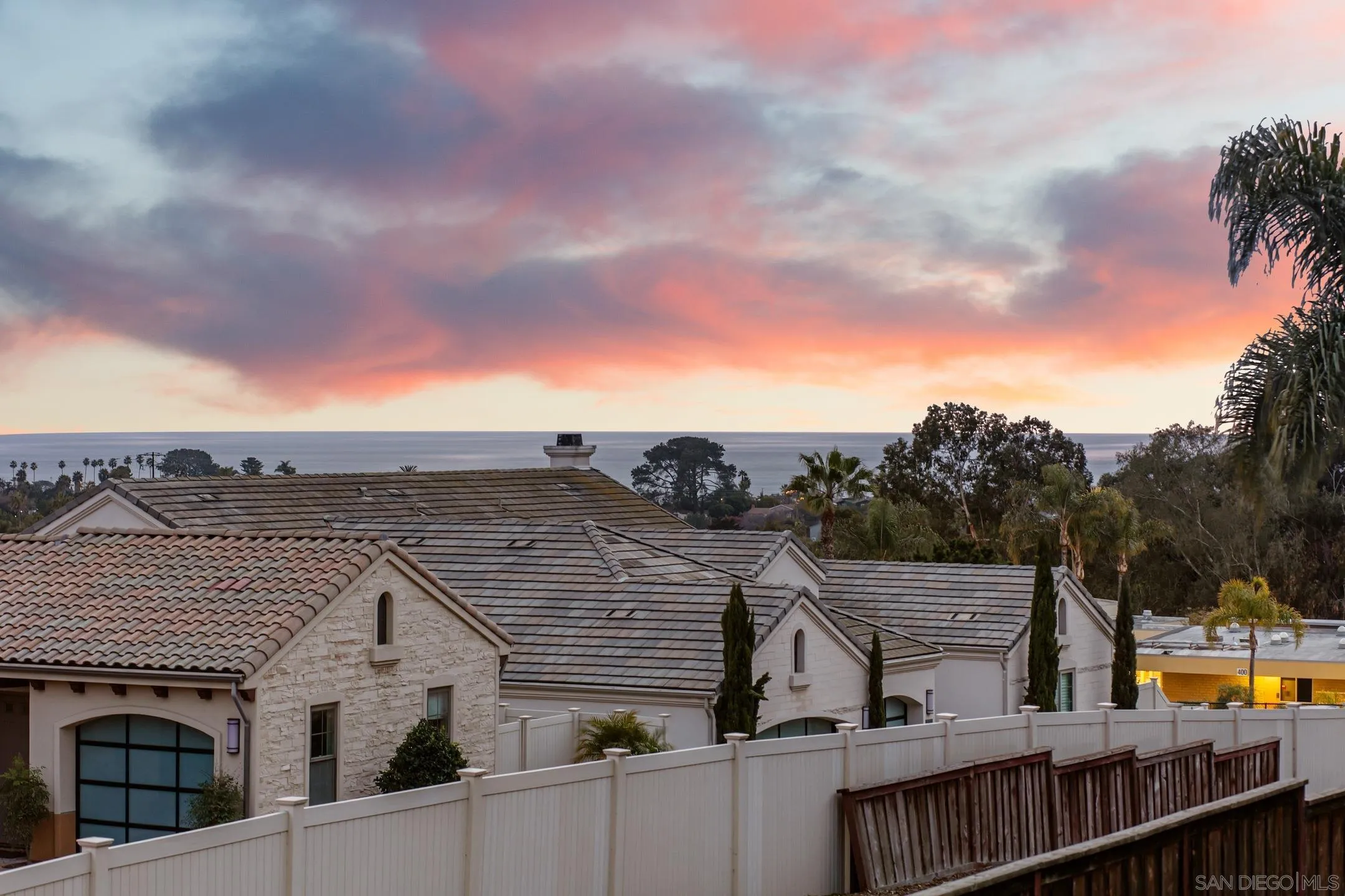 1449 Rainbow Ridge Lane Encinitas, CA 92024 - Photo 46 of 58 a view of a city from a balcony