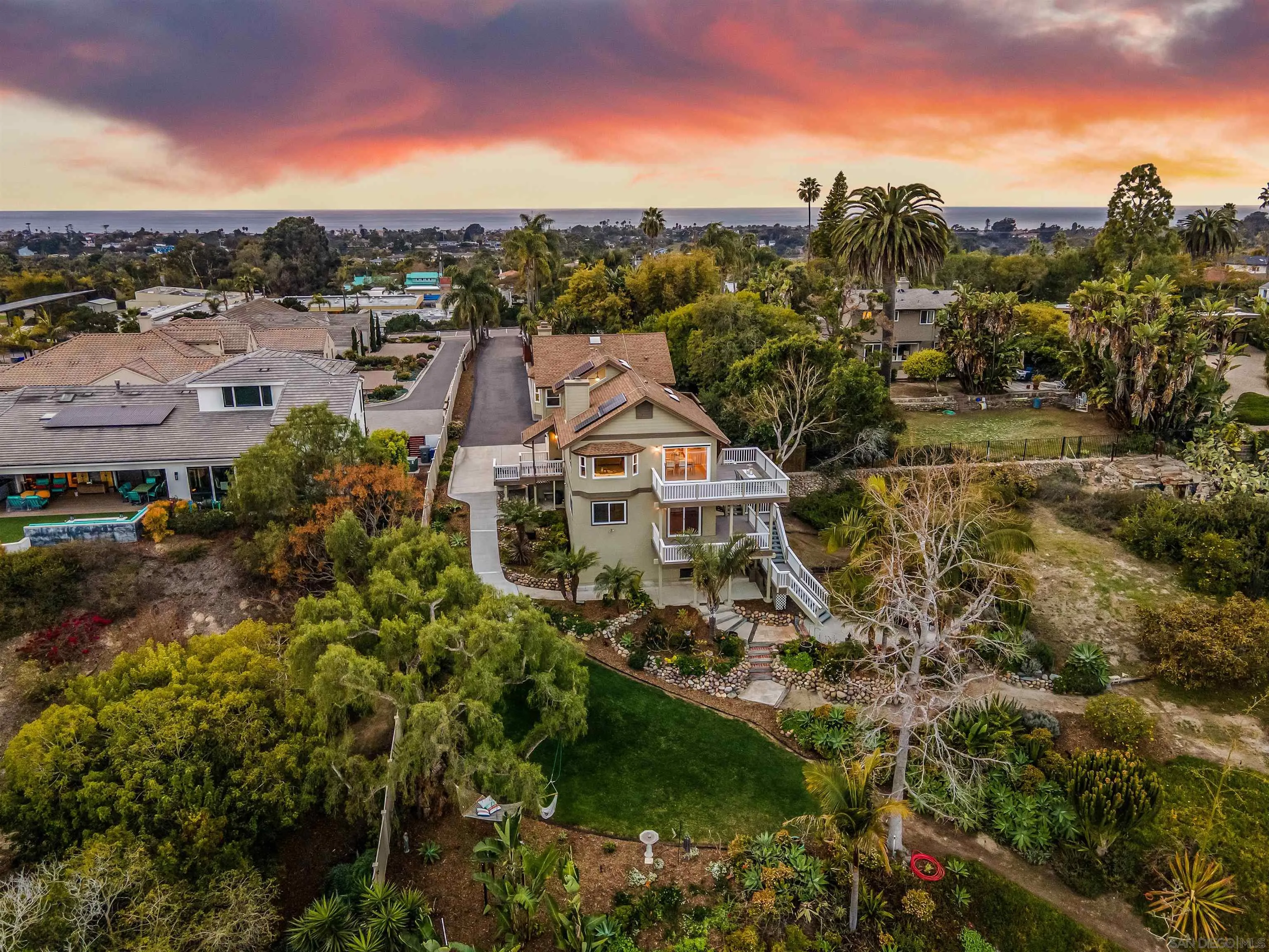 1449 Rainbow Ridge Lane Encinitas, CA 92024 - Photo 54 of 58 a view of a house with a mountain