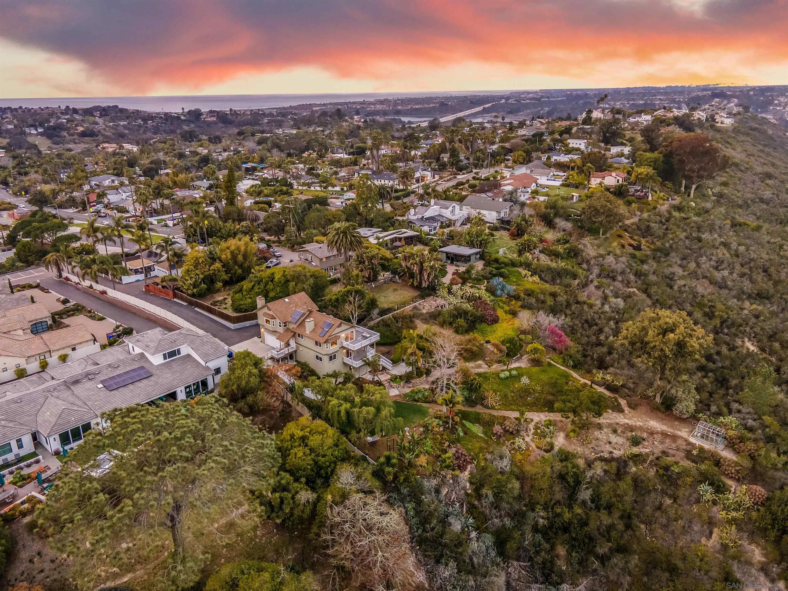 1449 Rainbow Ridge Lane Encinitas, CA 92024 - Photo 56 of 58 an aerial view of residential houses with outdoor space