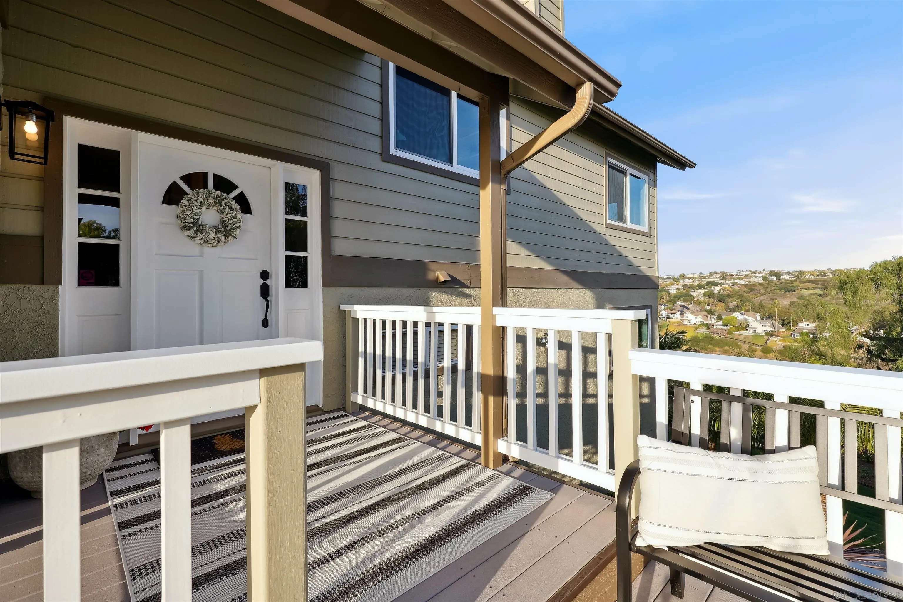 1449 Rainbow Ridge Lane Encinitas, CA 92024 - Photo 6 of 58 a view of a house with a porch
