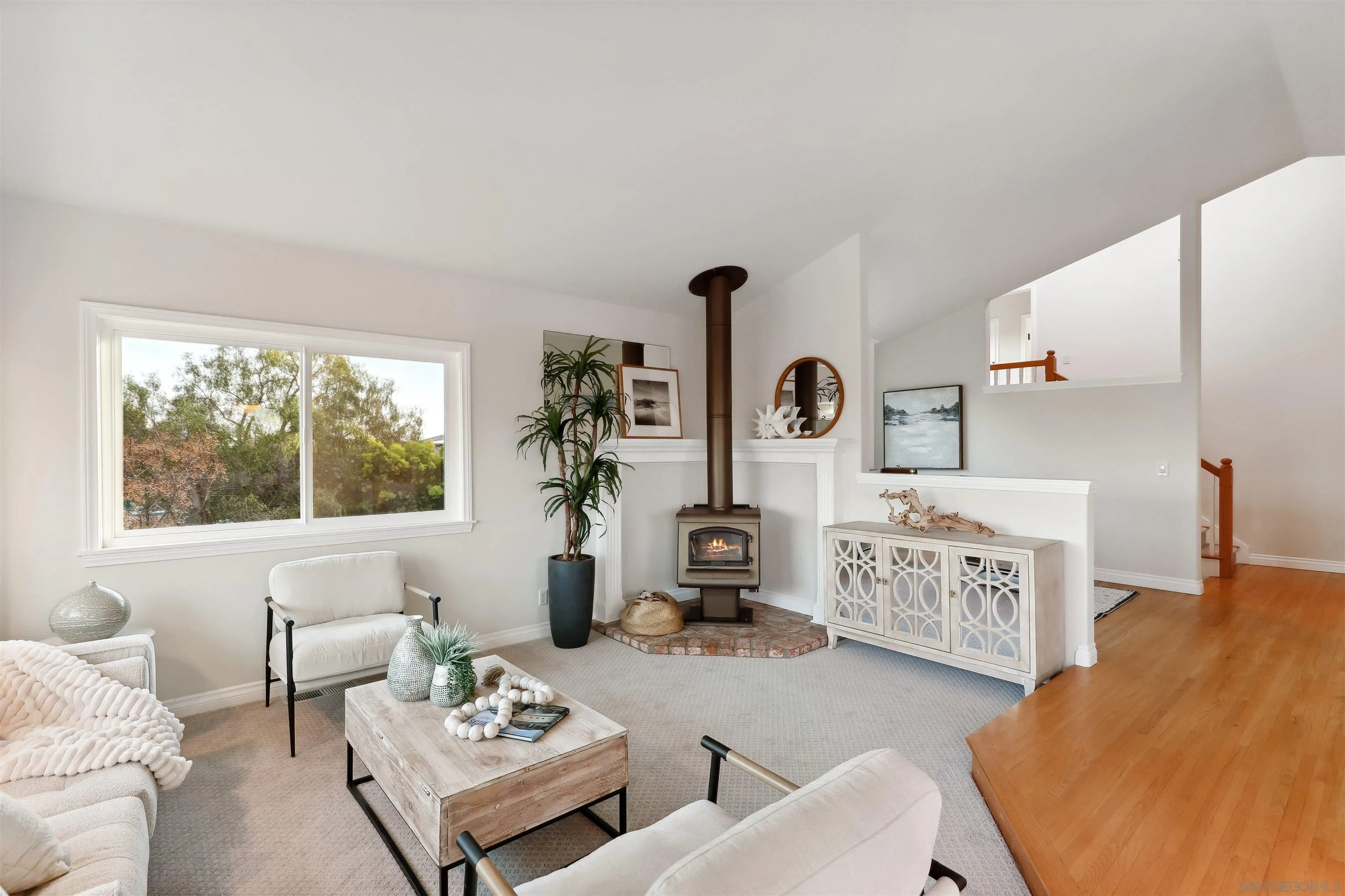 1449 Rainbow Ridge Lane Encinitas, CA 92024 - Photo 8 of 58 a living room with furniture and a large window