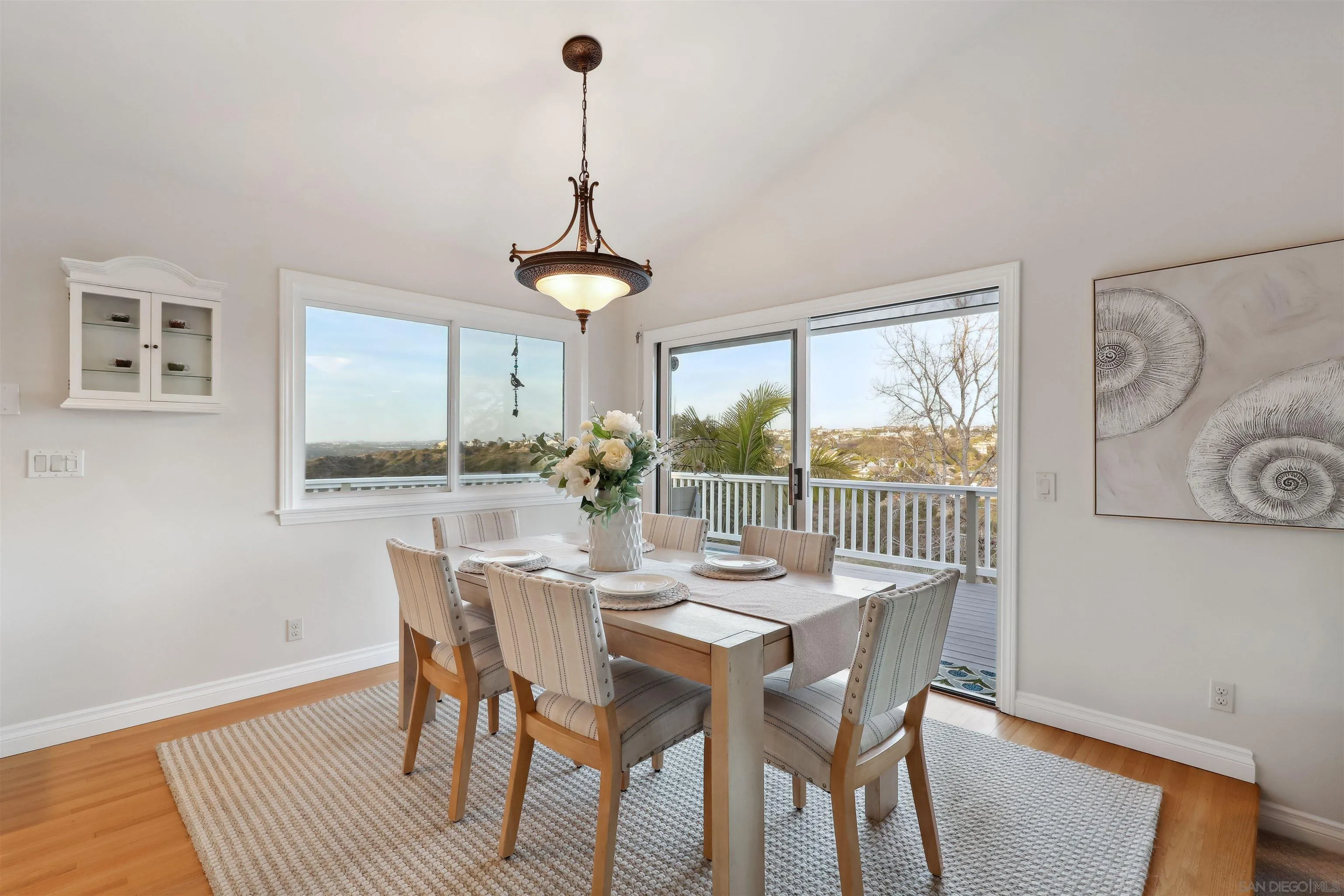 1449 Rainbow Ridge Lane Encinitas, CA 92024 - Photo 10 of 58 a view of a dining room with furniture window and outside view
