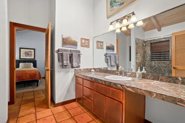 a room with a sink and a window