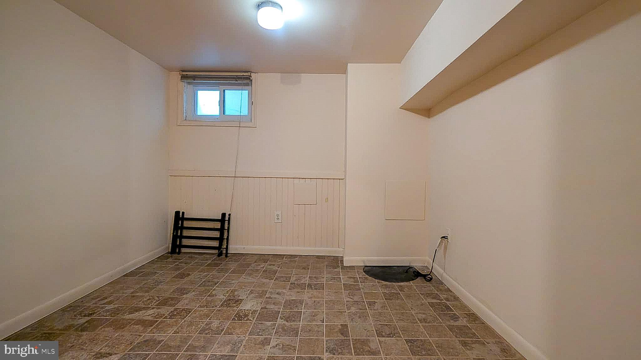 209 Penn Street Baltimore, MD 21201 - Photo 14 of 22 a view of empty room with wooden floor