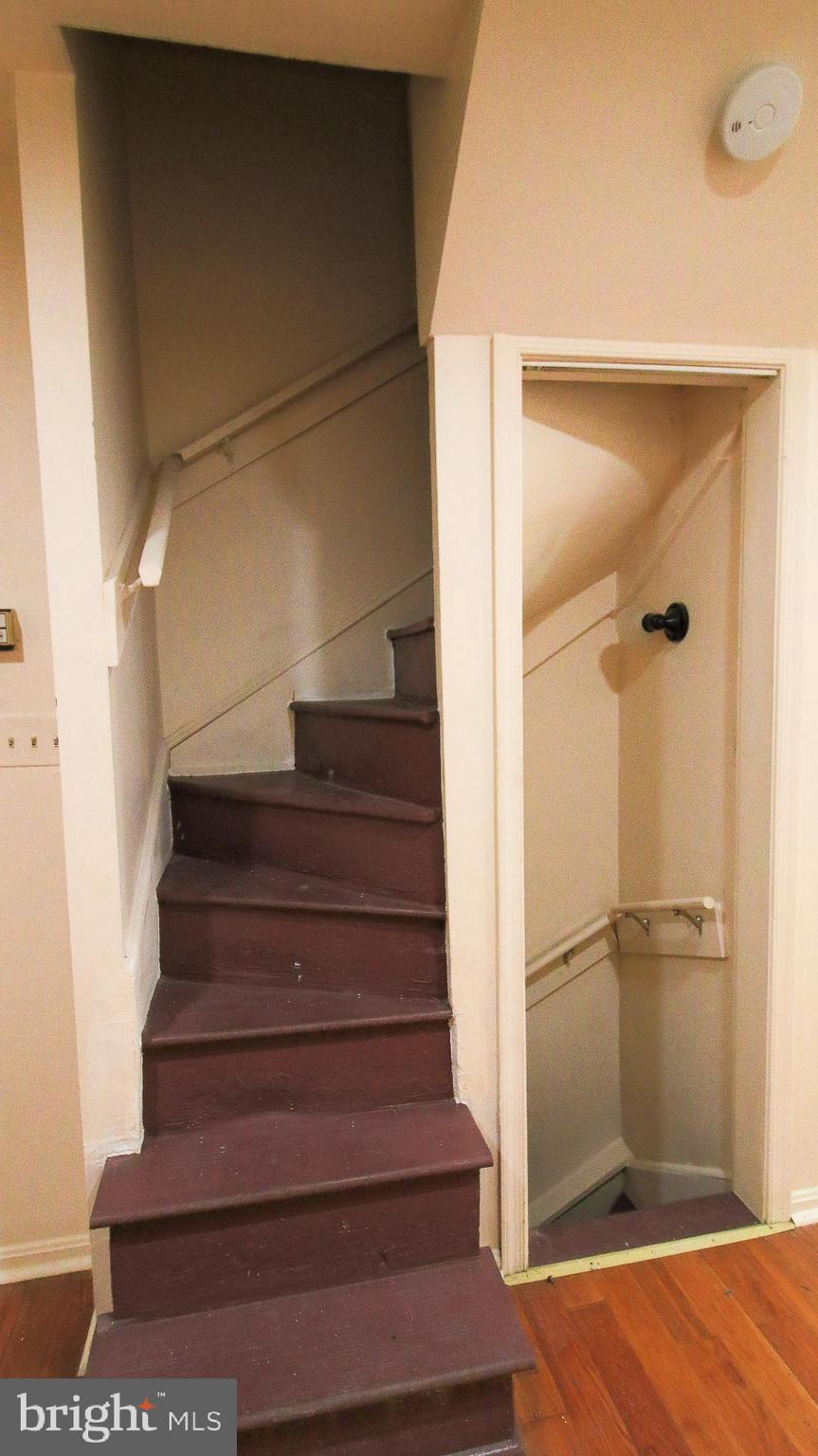 209 Penn Street Baltimore, MD 21201 - Photo 4 of 22 a view of entryway and hall with wooden floor
