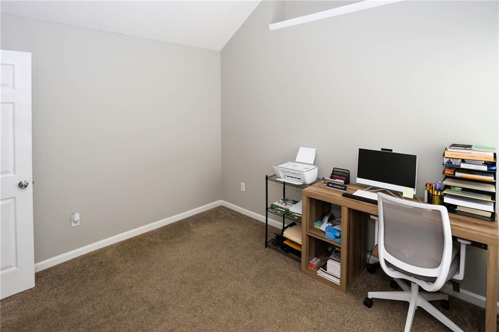 5854 El Segundo Way Atlanta, GA 30349 - Photo 24 of 63 a view of a workspace with furniture