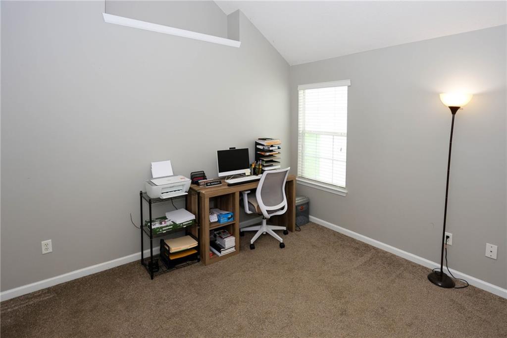 5854 El Segundo Way Atlanta, GA 30349 - Photo 25 of 63 a view of a workspace with furniture and a window
