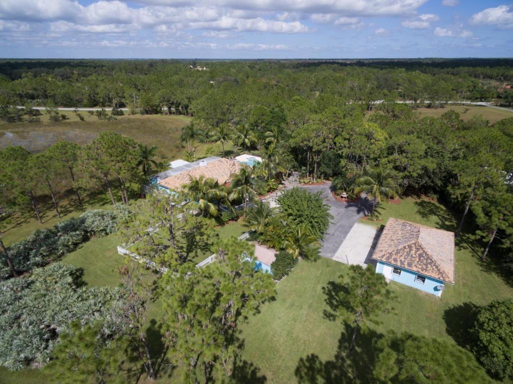 2914 Southeast Ranch Acres Circle Jupiter, FL 33478 - Photo 1 of 38 5+ acres- SPACE!