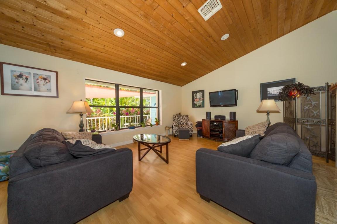 2914 Southeast Ranch Acres Circle Jupiter, FL 33478 - Photo 8 of 38 Formal Living area w firplace