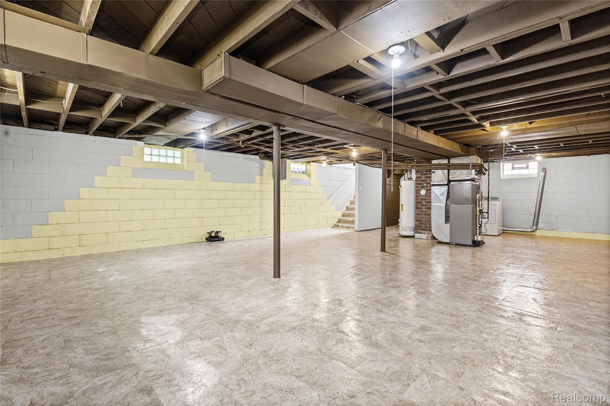 26508 Five Mile Road Redford, MI 48239 - Photo 31 of 41 Spacious basement with concrete flooring, exposed ceiling joists, and block walls
