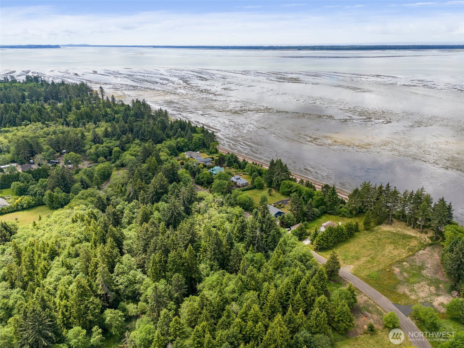 56 Ranta Road South Bend, WA 98586 - Photo 4 of 20 a view of a lake in middle of a field