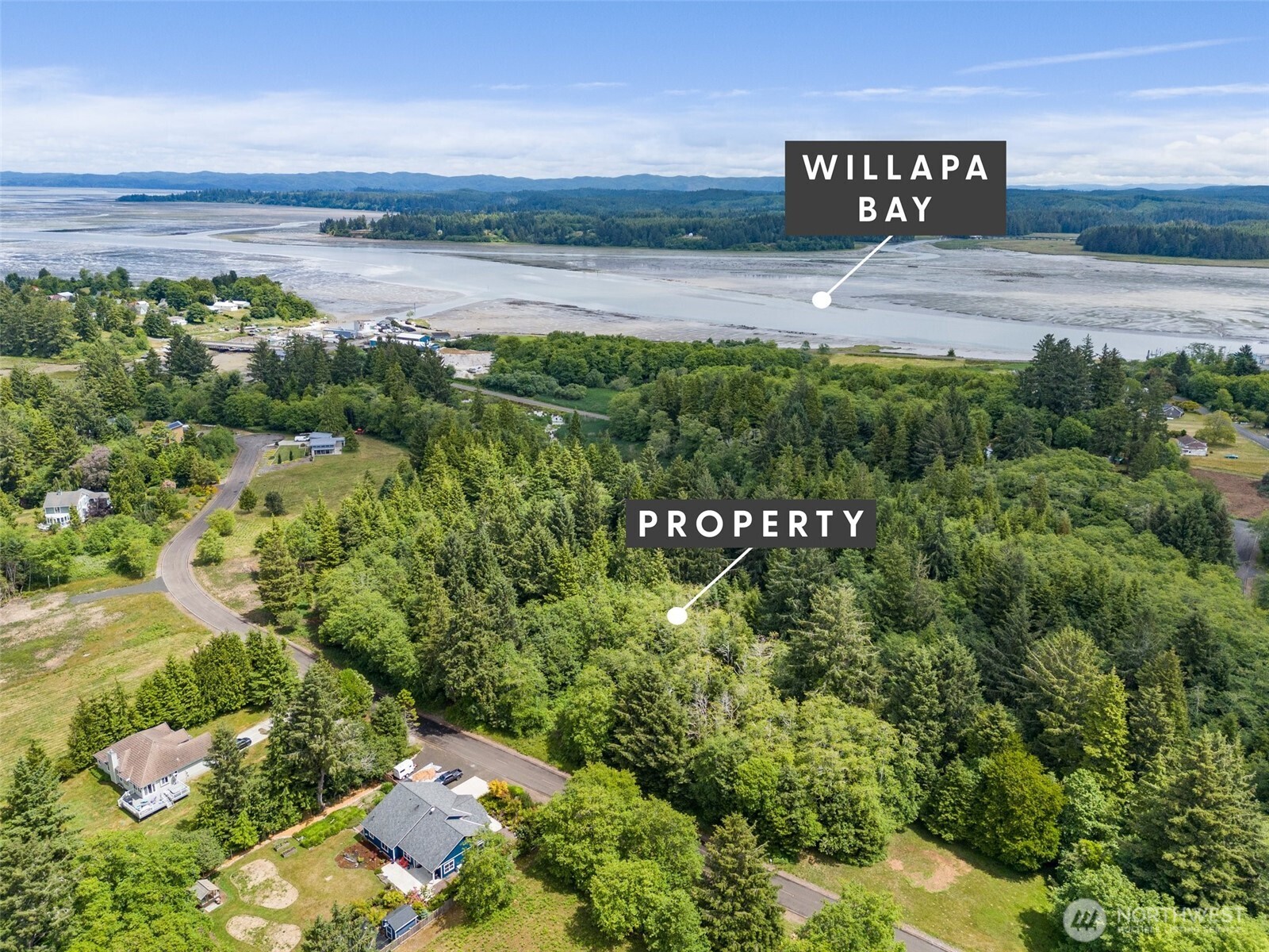 56 Ranta Road South Bend, WA 98586 - Photo 5 of 20 a view of a street with an ocean view