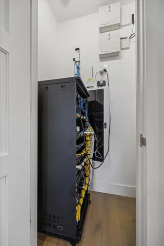 a view of walk in closet with clothes