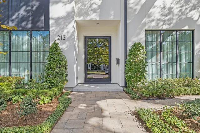a front view of a house having yard