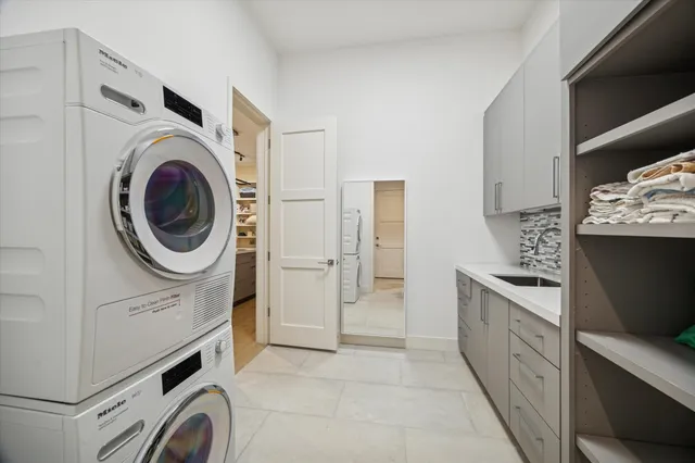 a view of a kitchen with washer and dryer