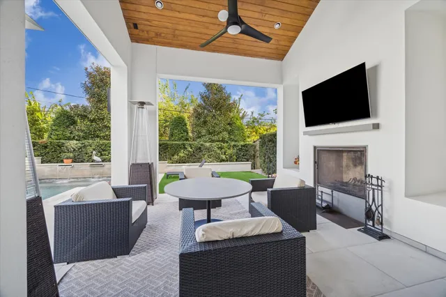 a view of a livingroom with furniture window and outside view