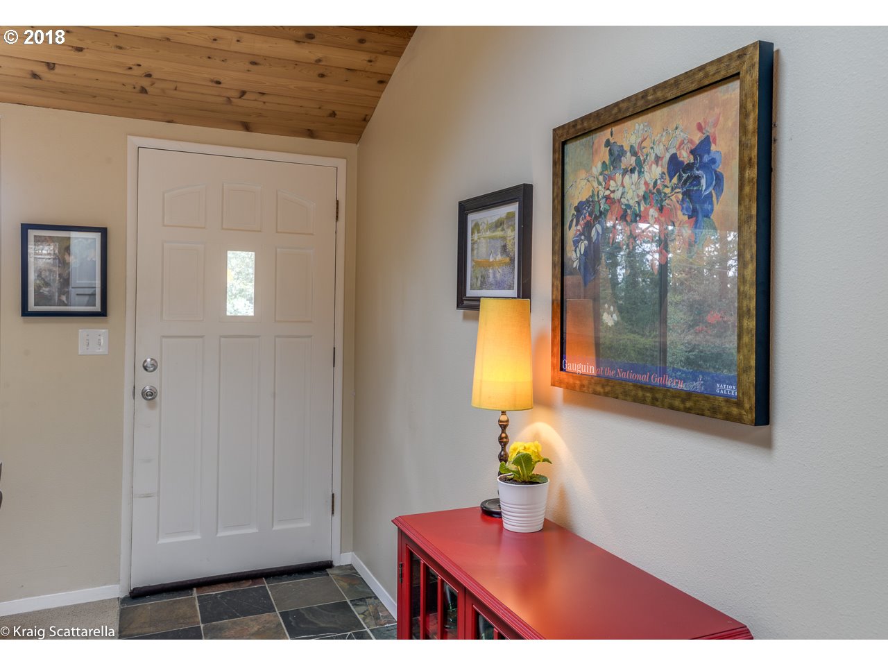 9 Southwest Collins Street Portland, OR 97219 - Photo 3 of 26 a view of an entryway with wooden floor