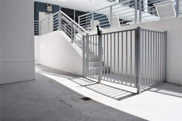 a view of a room with a white door