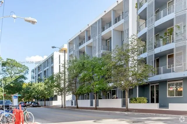 a view of a building with a street