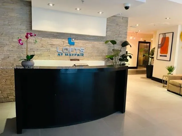 a view of a house with sitting area