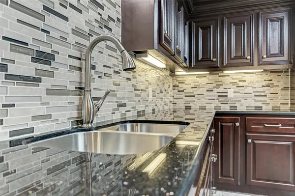 a view of a kitchen area of the house