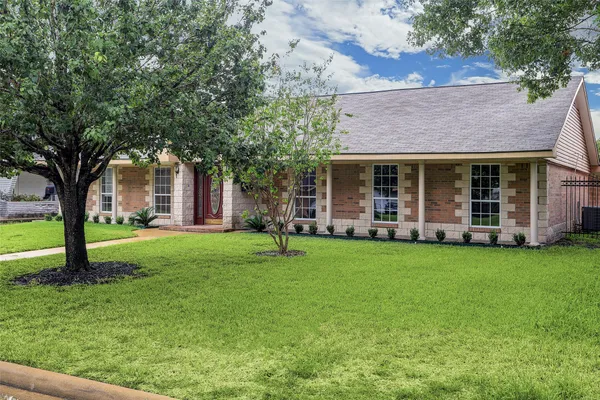 a view of a house with garden