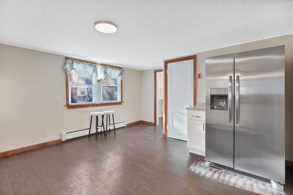 2022 Maple Street Three Rivers, MA 01080 - Photo 23 of 42 a view of workspace with window and wooden floor
