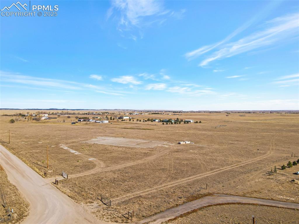 9475 Curtis Road Peyton, CO 80831 - Photo 2 of 4 a view of an ocean and beach