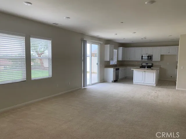 a view of a kitchen with a sink