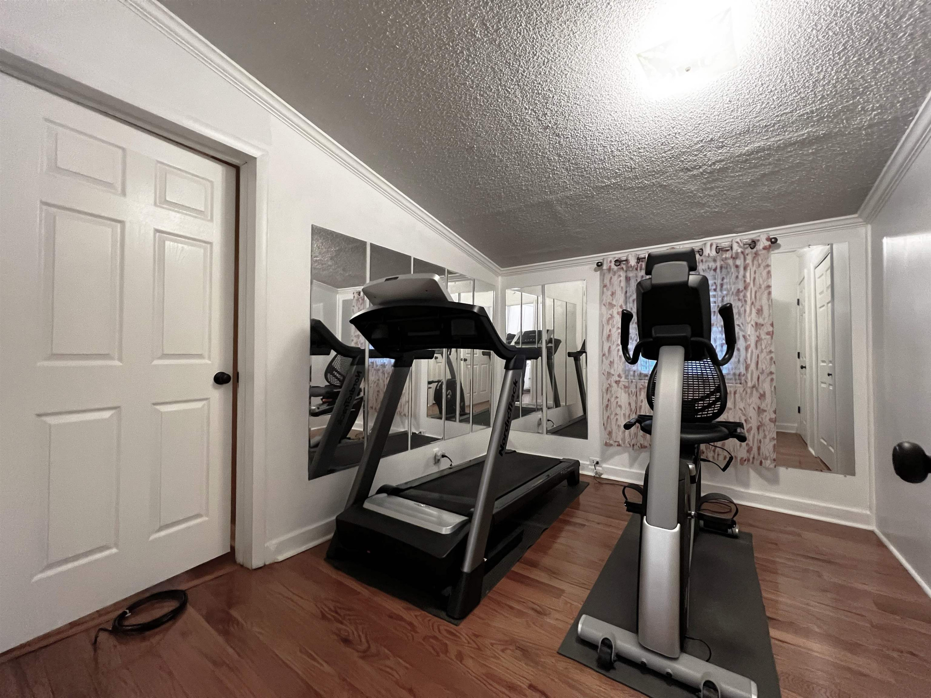 424 Eugene Street Durham, NC 27701 - Photo 12 of 26 a view of a room with gym equipment